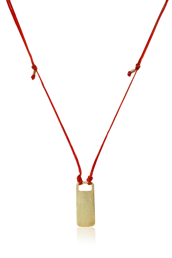 Drawstring Necklace A drawstring necklace with a lock shaped gold element