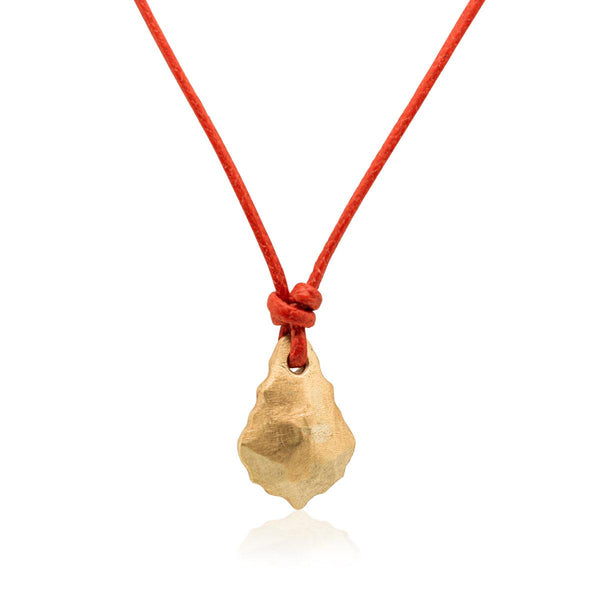 Drawstring Necklace A red drawstring necklace with a gold clasp. The pendant is a drop of ...